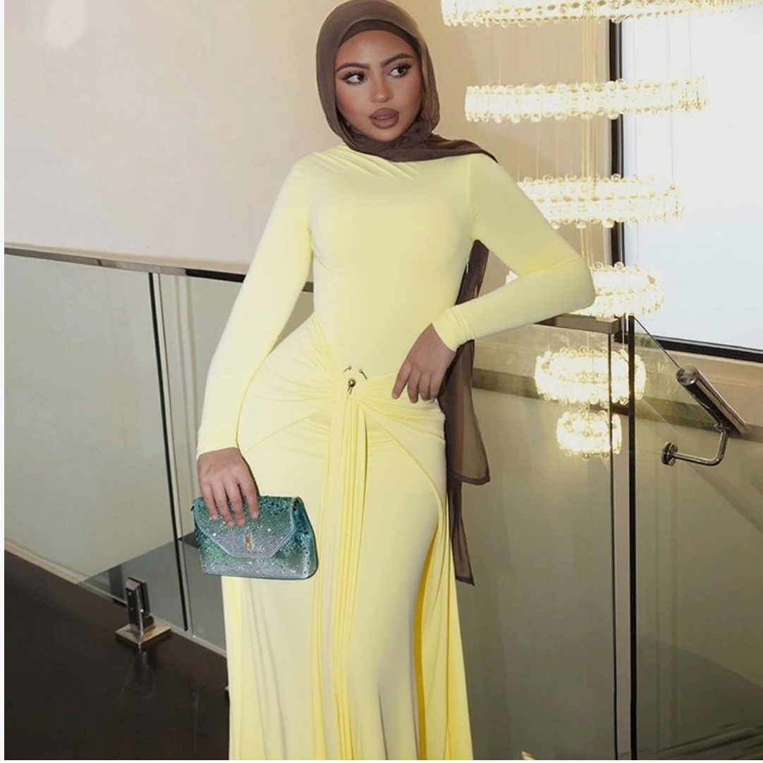 European and American 2025 new summer women's clothing temperament elegant decorative ring buckle solid color long-sleeved hip tight tie long skirt